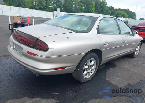 1997 Oldsmobile Aurora z USA, uszkodzony, nr VIN 1G3GR62CXV4121200